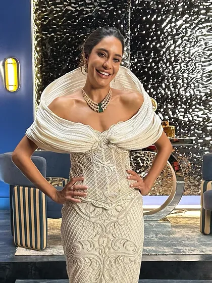 A closer look at Lisa Haydon in the hand-embellished ivory gown, a moment of pure red carpet couture.