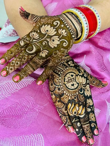 Another angle of the personalized lotus mandala design, showing how it pairs with a floral pattern on the other hand.