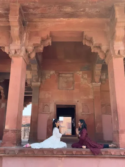 A moment of quiet connection and prayer with a friend. Sharing the journey of yoga makes it even more special.