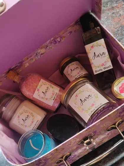 Need a last-minute gift? I've got your back. This floral trunk is filled with a variety of my products, including body wash, coffee scrub, Shea butter, and a scented candle.