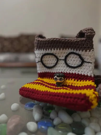Another look at the Harry Potter inspired pouch! This one is designed to look like his Gryffindor scarf, complete with the iconic glasses.