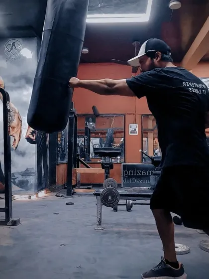 I practice what I preach. A focused session on the punching bag not only builds strength and cardio but also acts as a great stress buster. This is part of the functional fitness training I offer.