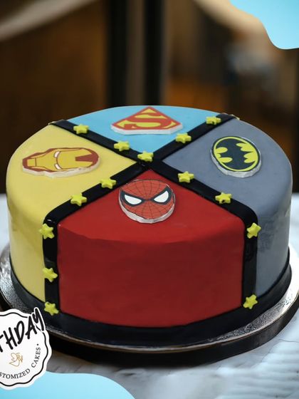 Why choose one hero when you can have four? This cake is divided into sections for Batman, Iron Man, Spider-Man, and Superman, making it the ultimate superhero crossover.