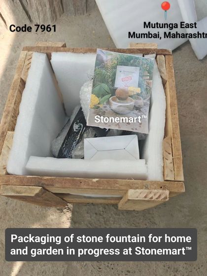 The inside of a packed crate, showing the fountain components nestled securely in foam. We include all necessary parts, like the water pump.