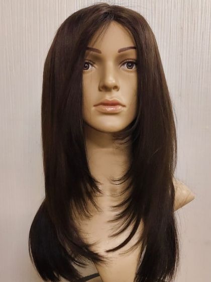 A mono base hairpiece with a beautiful layered cut. The monofilament top allows for natural movement and parting, blending seamlessly for a fresh-from-the-salon look.