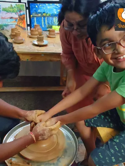 Look at that smile! The pottery wheel is a magical experience that combines sensory input with the thrill of creation. It’s a fantastic way for kids to develop focus and see their ideas take shape right before their eyes.