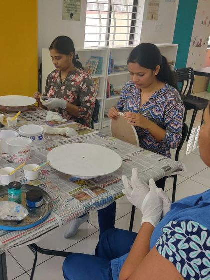 A view of the resin art workshop table, where everyone is getting hands-on experience with this fascinating medium.