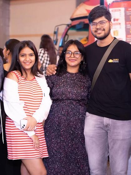 A group of friends posing for a photo at the event.