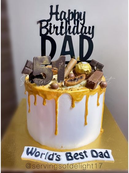 A drip cake for the "World's Best Dad," loaded with his favorite chocolates. A delicious way to celebrate his 51st birthday.