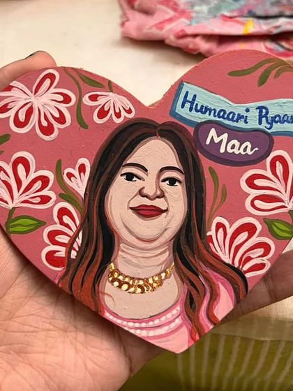 A heart-shaped 'Humaari Pyaari Maa' (Our Lovely Mom) plaque, a perfect personalized gift for Mother's Day.