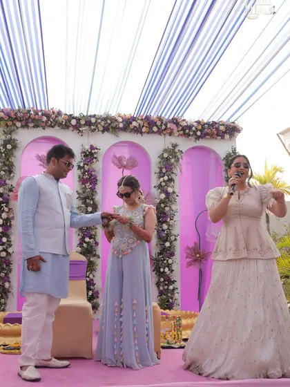 A glimpse from a fun-filled Haldi carnival. I thrive on interactive games that get everyone, from the couple to their shyest friends, involved and laughing. My job is to create these moments of pure, unscripted joy.
