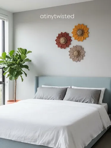 Imagine these handmade macramé flowers bringing a bit of sunshine into your home. I designed this set of three in warm, earthy tones to add a touch of modern boho charm above a bed, but they look just as lovely in a living room or entryway.