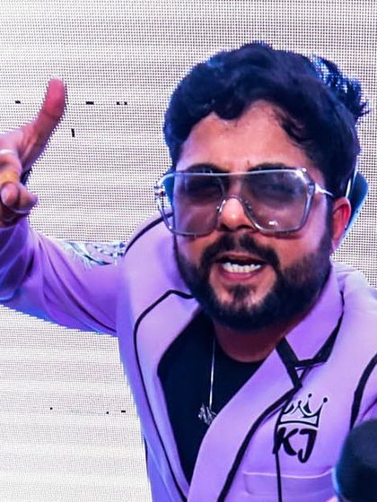 "Say my name." A powerful close-up during a performance, showing my custom jacket and confident expression.