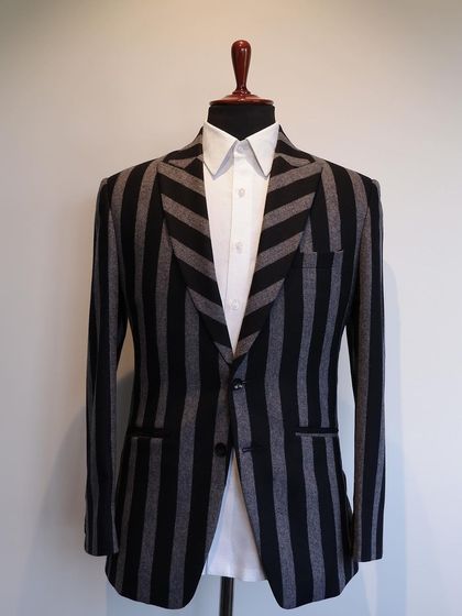 Pause for a classic break with our two-button jackets in flannel wool. This striped version offers a bold, graphic statement.