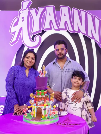 A happy family portrait with our Willy Wonka themed cake. We were delighted to create this whimsical, candy-filled masterpiece for this 8th birthday party.