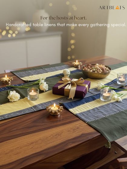 My table linens are designed to make every gathering special, especially during festive seasons. Here, a table is set with my handcrafted runner and placemats, creating a warm foundation for a celebration with loved ones.