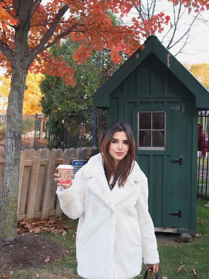 A smiling, direct-to-camera version of the previous shot, offering a more engaging option for brands.