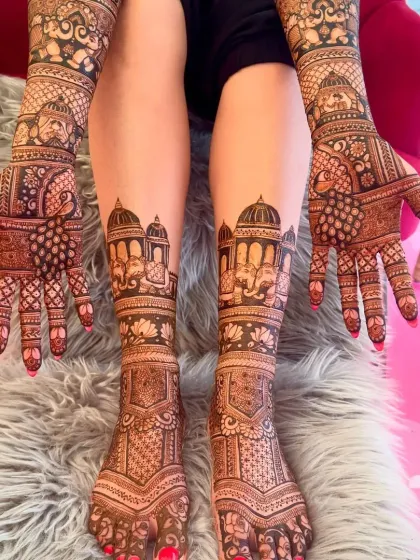 Full coverage for the bride, from hands to feet. This design features royal elephants and palace architecture, perfect for a grand wedding theme.