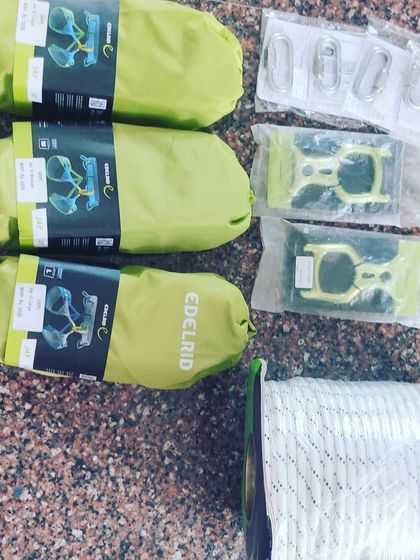 An overhead shot of our new harnesses, descenders, and ropes. We believe in transparency about the quality of our gear.