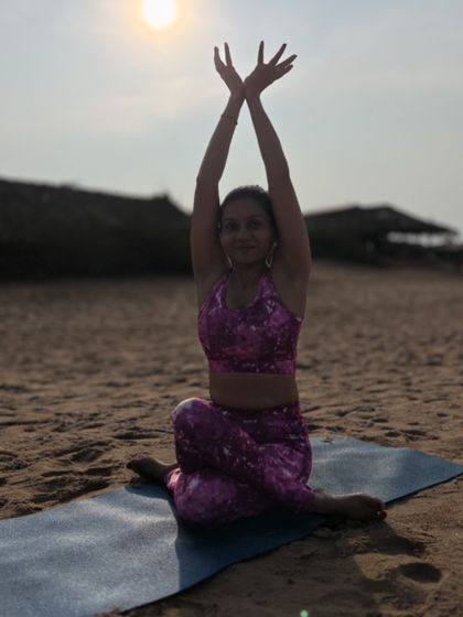 The sun is a daily reminder that we too can rise from the darkness. A beautiful seated pose on the beach, shining my own light.