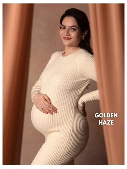 A simple and elegant portrait in a cream-colored ribbed dress. The "Golden Haze" effect creates a warm and dreamy glow.