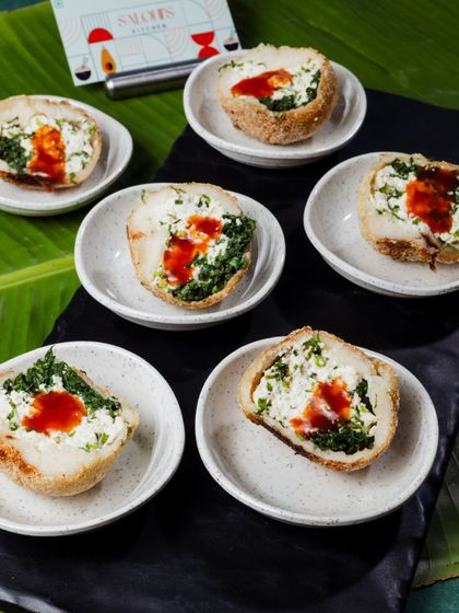 My crispy Jade Balls are a delightful vegetarian appetizer. These are filled with a savory mixture and fried to perfection, served with a sweet chili dip.