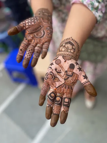 Mehandi can reflect your passions. This unique design was created for a basketball-loving bride, featuring a detailed figure of a player in action, showing that any story can be told through henna.