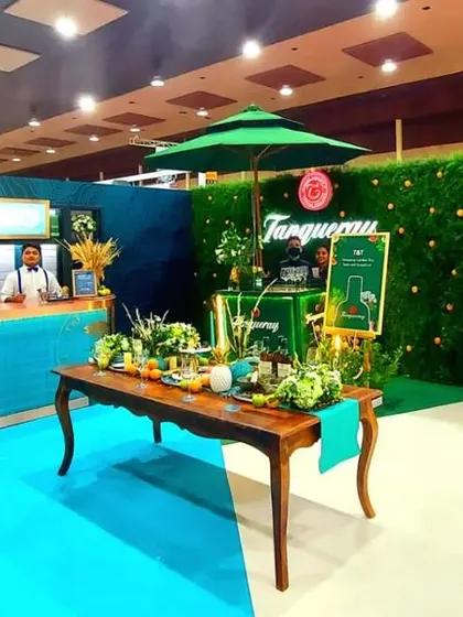 We design and build immersive brand activation spaces, like this vibrant setup for Tanqueray and Baileys. It features a main bar, a separate tasting cart, and themed decor to create a memorable destination for event attendees.