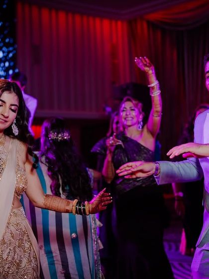 The bride and groom enjoying the dance floor with their guests.