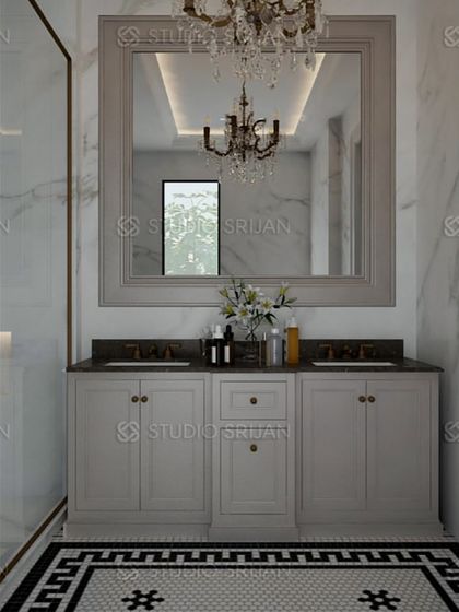 This view highlights the custom double vanity with a large, framed mirror and a classic chandelier, adding a touch of timeless elegance to the bathroom.
