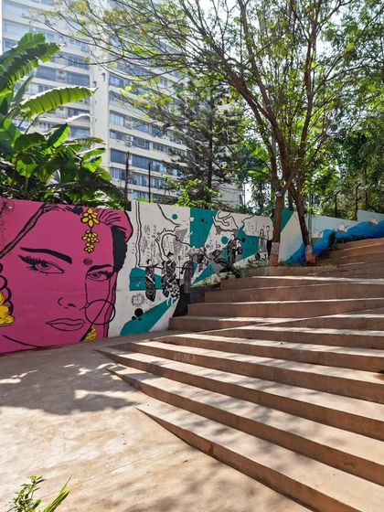 A colorful mural brings life to the walls of The Steps. We collaborate with local artists to ensure our public spaces reflect the unique cultural identity and 'swag' of Mumbai.