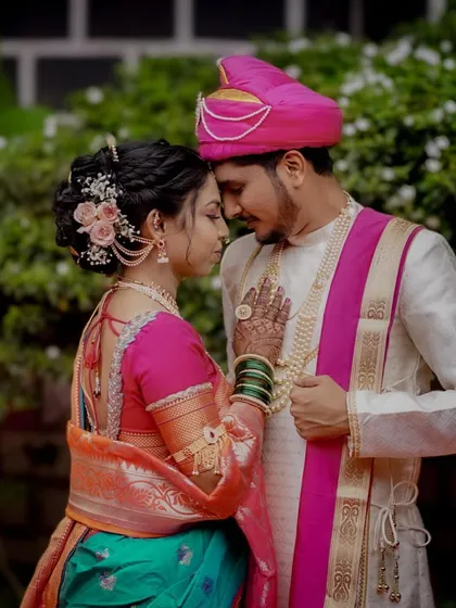 An intimate and romantic portrait of a Maharashtrian couple. The bride's hand on her groom's chest and their close embrace speak volumes of their connection.