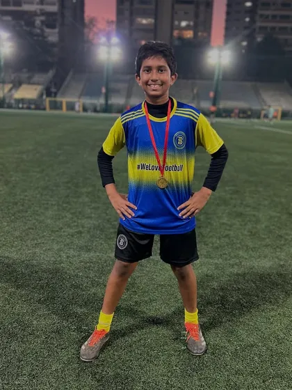 A confident pose from a Player of the Month who always gives his all.