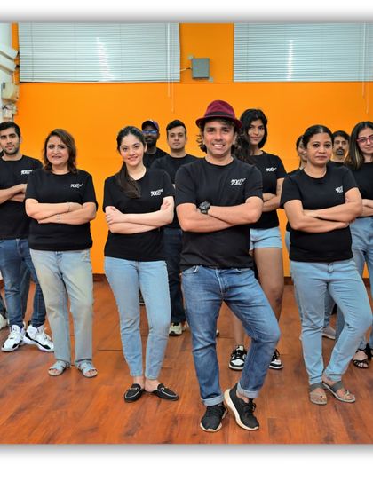 The team is ready. A group photo showcasing the confidence and unity of our dancers.