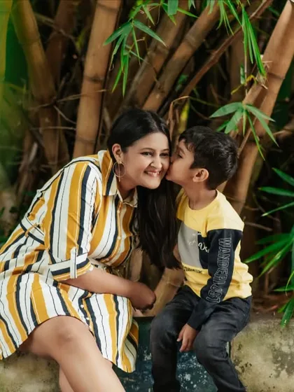 Capturing a sweet, candid moment between a mother and son during an outdoor family photoshoot. These are the precious memories you will treasure forever.