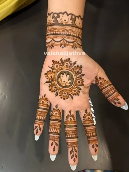 A single hand with a lotus mandala. This design is simple, clean, and very modern, perfect for someone who loves minimalist art.