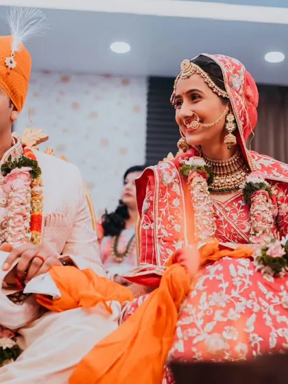 A quiet, shared glance between the bride and groom during their ceremony. These are the subtle, intimate moments we seek to capture, telling a story of love and partnership.