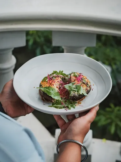 Baked portobello mushrooms with a sweet onion puree, flavor-intense pesto, and sourdough crumbs. A delightful medley of comfort and cultures.
