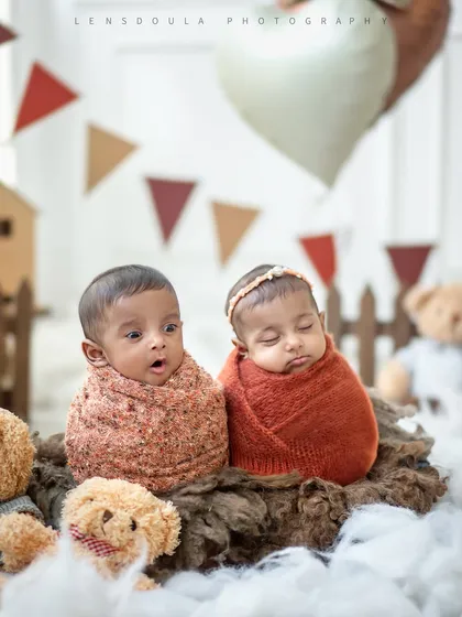 Capturing the quiet miracle of twins. One alert and curious, the other peacefully dreaming. We handle every newborn session with the utmost patience and care, ensuring your tiniest treasures are safe, comfortable, and beautifully photographed.