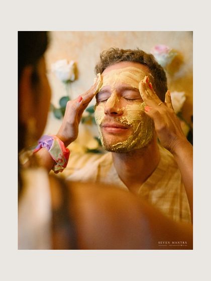 A quiet moment of ritual during the Haldi ceremony in Italy. It shows the beautiful, gentle side of this traditionally playful event.