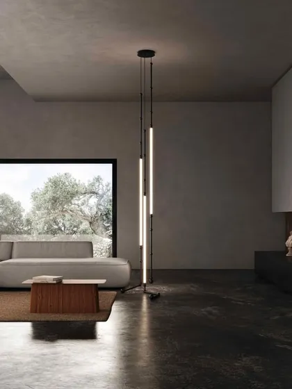 The Leda lighting system by Karman, shown here as a minimalist floor lamp. Its flexible, illuminated tubes can be arranged in countless configurations to suit any space.