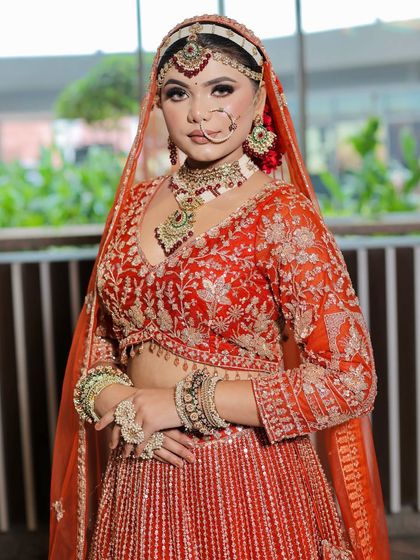 A closer look at the bride's radiant makeup. The soft smokey eye and nude-pink lip create a balanced and elegant look.