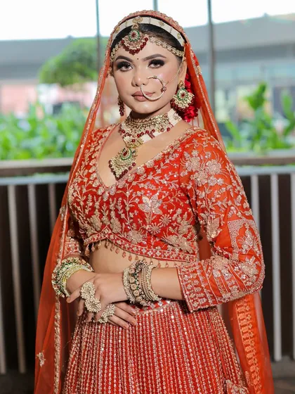 A closer look at the bride's radiant makeup. The soft smokey eye and nude-pink lip create a balanced and elegant look.