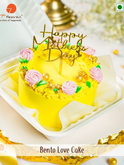 A little cake with a lot of love. This bright and cheerful yellow Bento Love Cake is the perfect personal-sized treat for Mother's Day.