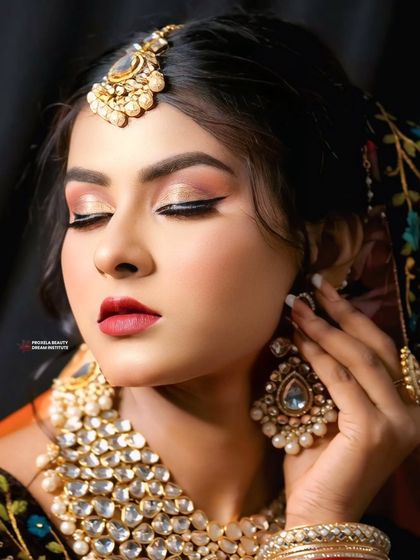 The eyes-closed version of this look puts the focus on the perfectly blended eyeshadow and the flawless, glowing skin. It’s a sophisticated look for any grand occasion.