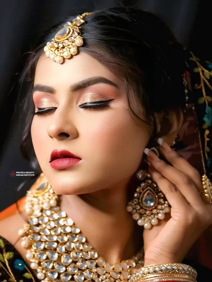 The eyes-closed version of this look puts the focus on the perfectly blended eyeshadow and the flawless, glowing skin. It’s a sophisticated look for any grand occasion.