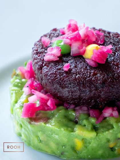 A detailed shot of the Beetroot Murabba Kebab with avocado salsa, showing the beautiful contrast of colours and textures.