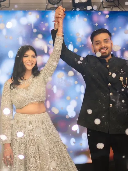 A happy shot of the couple on stage.