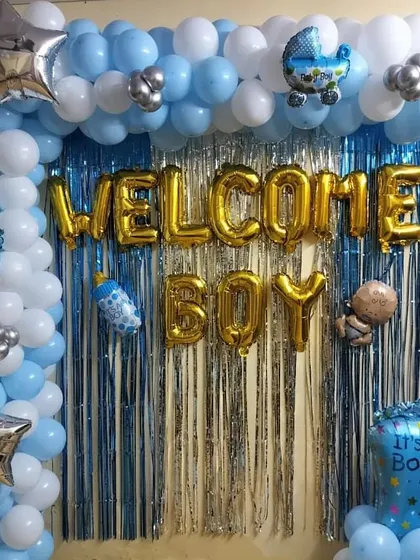 A full view of the "Welcome Boy" home decoration. This angle shows the entire balloon frame, foil letter arrangement, and character balloons that complete the festive look for your newborn's arrival.