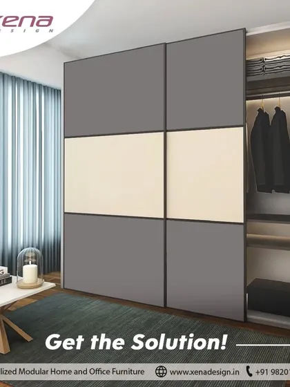 The solution to clutter is a well-designed modular wardrobe. This sliding door wardrobe with a clean, two-tone finish offers ample, organized space, turning chaos into calm.